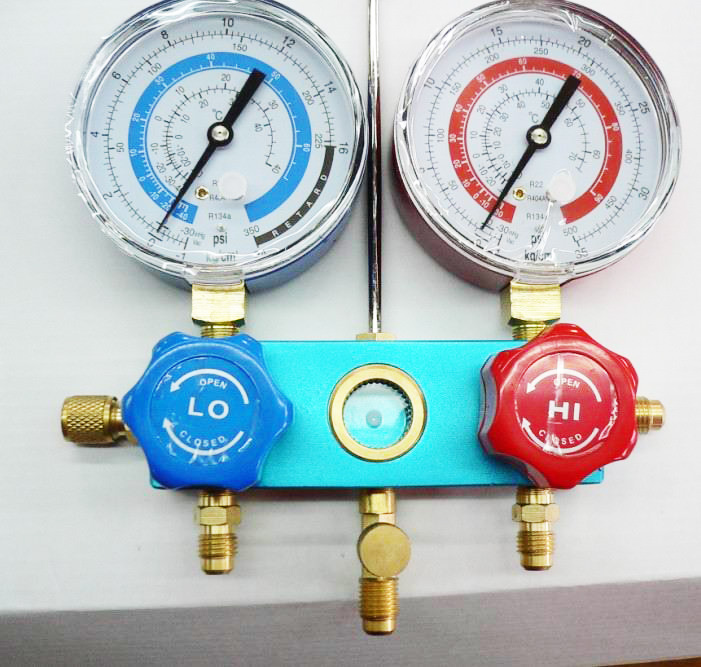 Pressure reducing gauge set for Freon cleaning machine